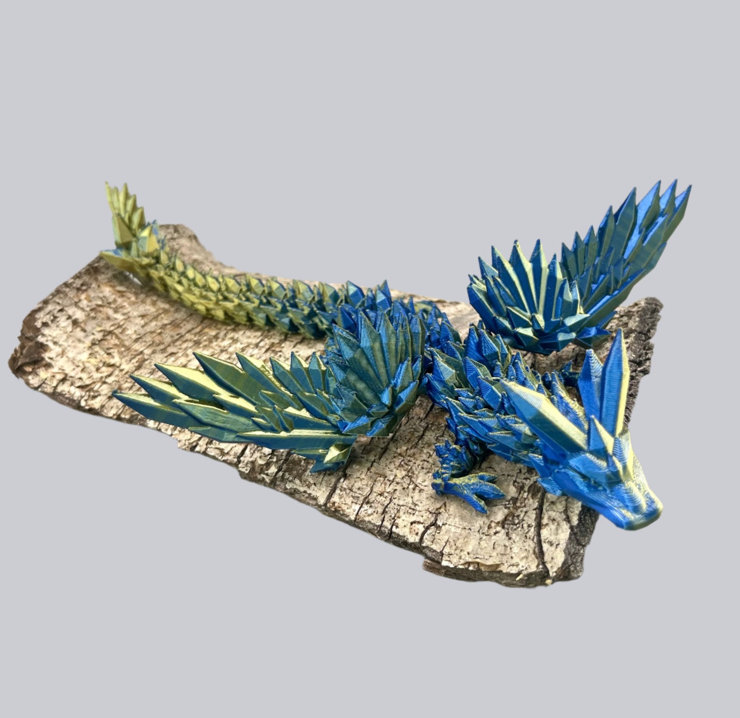 Impressive 3D printed winged dragon, perched on wood, wings outstretched and covered in beautiful spikey crystals all over, from head to tail