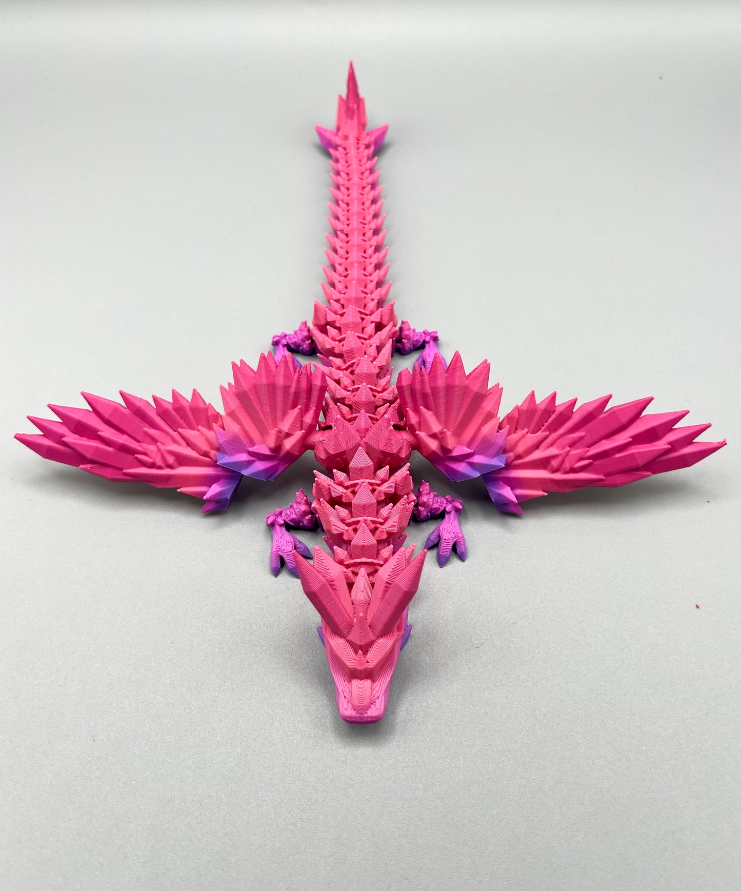 Impressive 3D printed winged dragon, wings outstretched and covered in beautiful spikey crystals all over, from head to tail