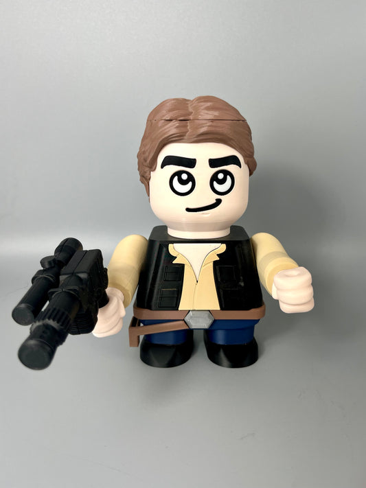 3D printed figure of a character with brown hair, detailed facial features, holding a weapon. Set on a grey background.