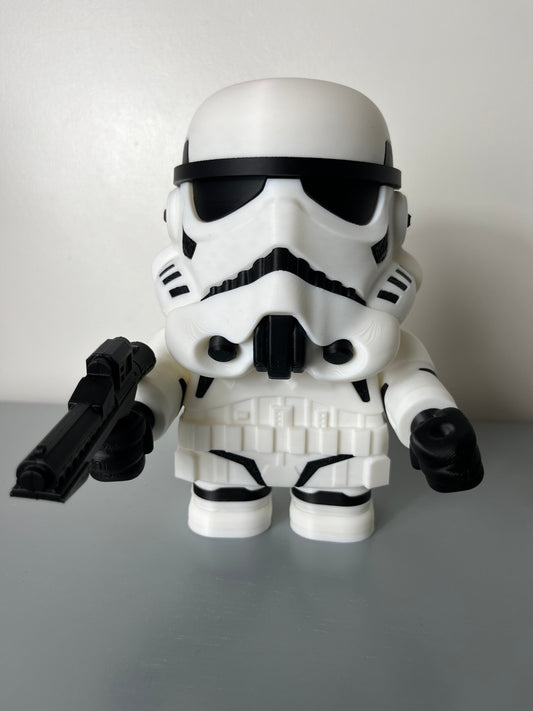3D printed film character in a white suit with white mask, holding a gun