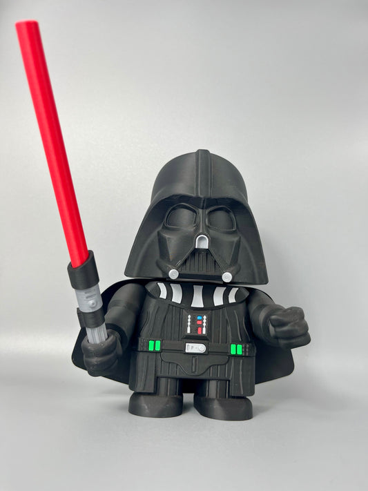 3D printed figure of a character in a black costume, black mask holding a red lightsaber. Standing against a grey background