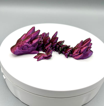 3D printed compact sized gem dragon with small rounded spikes all over, from head to tail