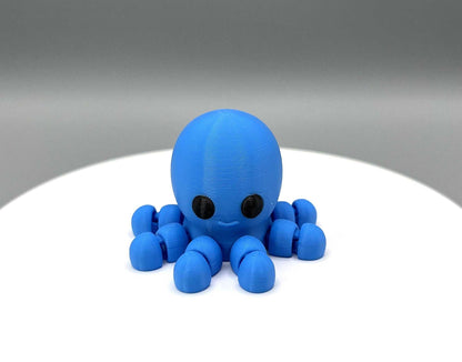 A 3D Printed Octopus Mini Figure with articulated legs and a cute face, perfectly pocket sized