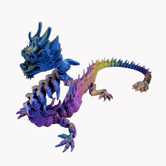 A 3D-printed figurine of a colourful Imperial Dragon with a detailed design, featuring a mix of blue, gold and purple hues. Set against a white background.