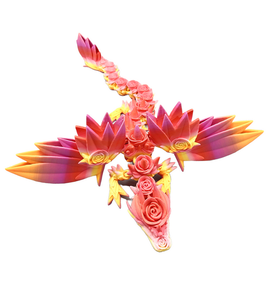 Colourful dragon with wings outstretched and small detailed roses and thorns trailing down from it's head to it's tail. Set on a white background. 