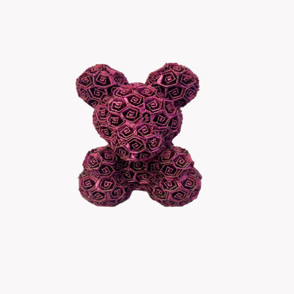 A 3D printed bear covered entirely in small textured roses