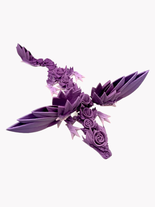 Beautiful 3D printed winged lilac toned dragon, with wings outstretched and gorgeous rose and thorn detailing all over, head to tail